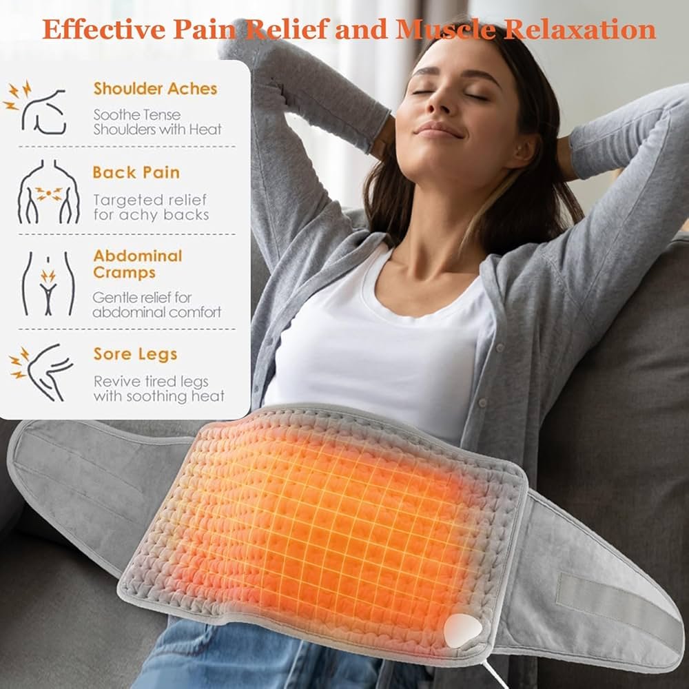 Person using a heating pad on lower back while relaxing at home