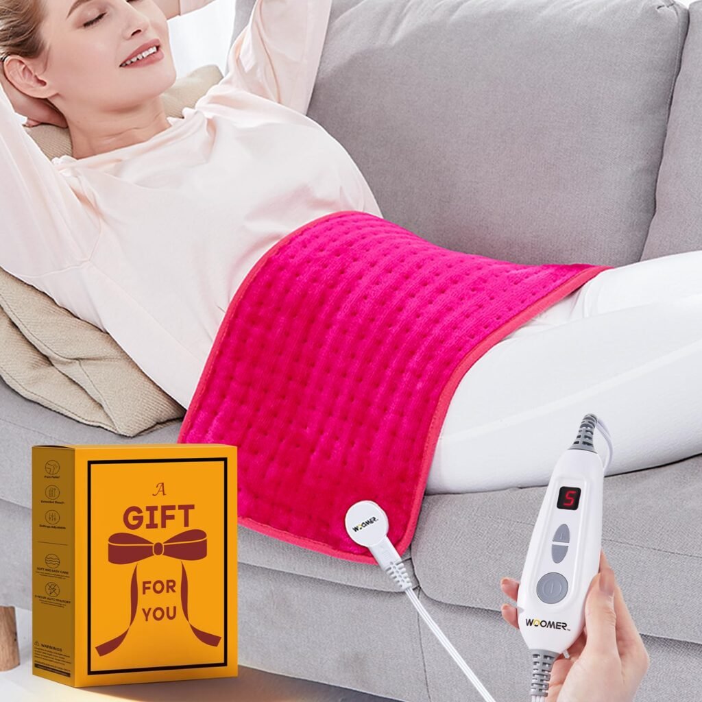 person using heating pad on lower back with timer control safely at home