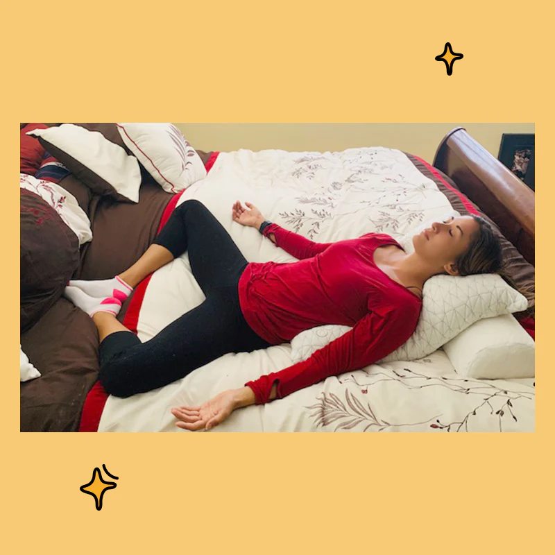 person experiencing lower back pain in the morning