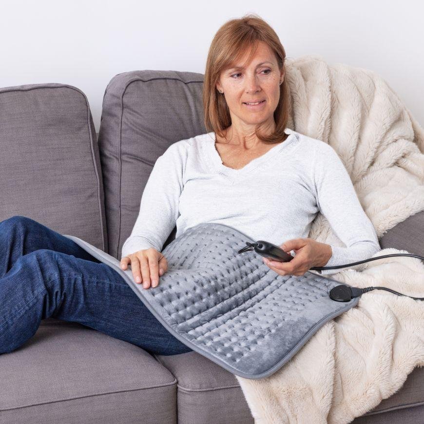 safe daily use of heating pad for lower back pain at home